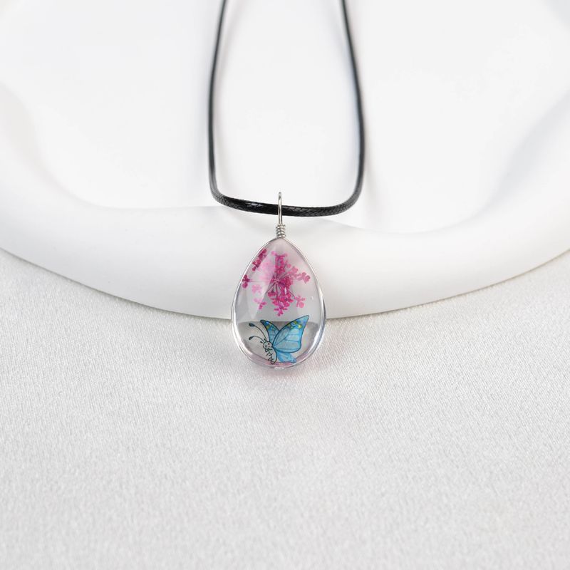 Collana con fiore in pizzo e cielo stellato in stile fresco, goccia d'acqua in vetro, tempo Jingdezhen, vendita calda_voghion.com