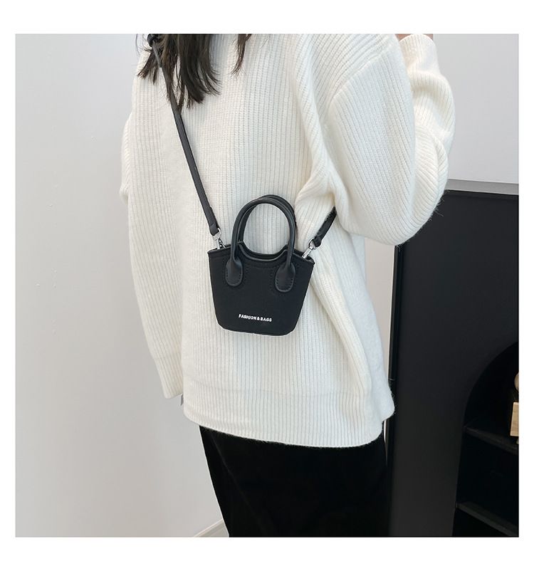 Borsa a secchiello da donna, alla moda, con tracolla monospalla, stile Candy Lover, con rossetto, da portare a spalla, rossa_voghion.com