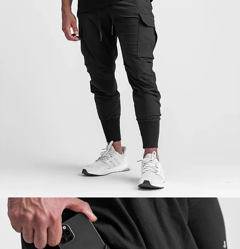 Pantaloni sportivi da palestra ad asciugatura rapida da uomo Pantaloni da corsa Tasche Pantaloni cargo da allenamento Pantaloni da jogging da allenamento Fiess Casual_voghion.com
