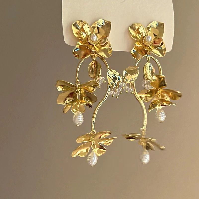 Nappa con fiore scavato con ago d'argento, alla moda, personalizzata, stile fresco e distaccato, lunga, elegante e di alta qualità._voghion.com
