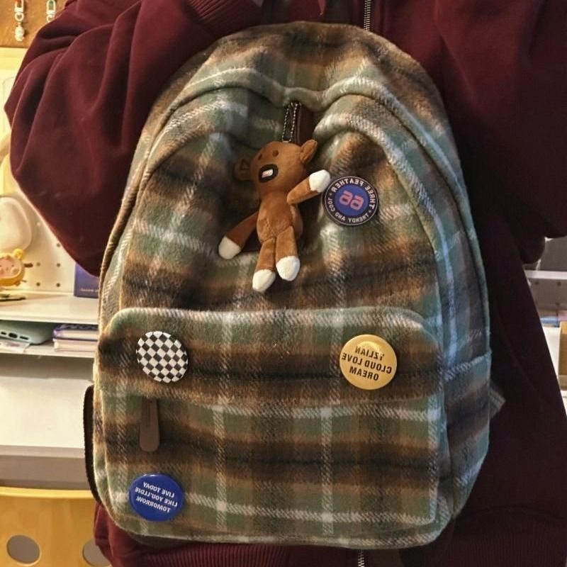 Estudantes do ensino médio Wind, primavera de 2025, versão coreana da centena dentro da roupa xadrez para deslocamento, moda versátil, bolsa de ombro diária_voghion.com