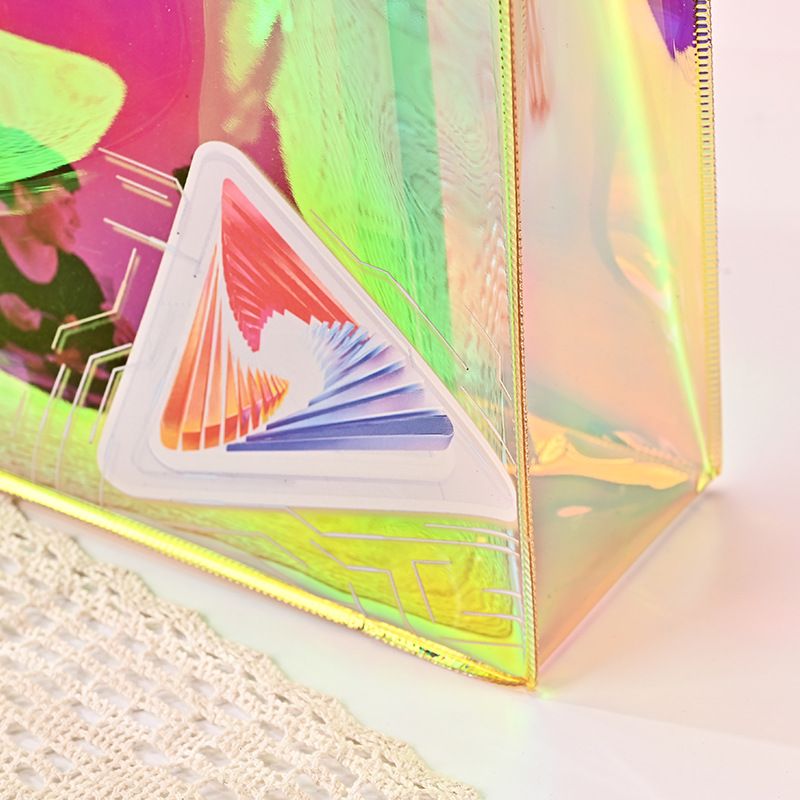 Straight color PVC laser bag for women's clothing store, fashionable high-end shopping handbag_voghion.com