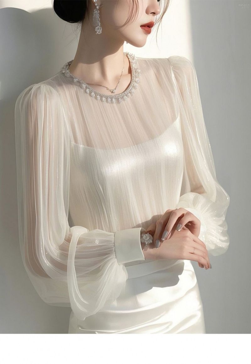 Dameskleding Modieus Leeftijdsverlagend Koud Hoogwaardig Wit Licht Transparant Chiffon Shirt met Lange Mouwen_voghion.com