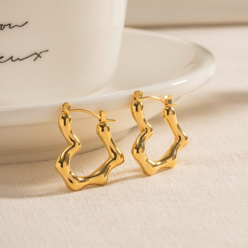 French gold-plated earrings women's earrings personality high-level temperament niche lava love earrings earrings_voghion.com