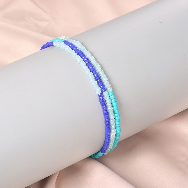 Modieuze sieraden, kralen schoenen, kleurrijke, gelaagde voetkettingen_voghion.com