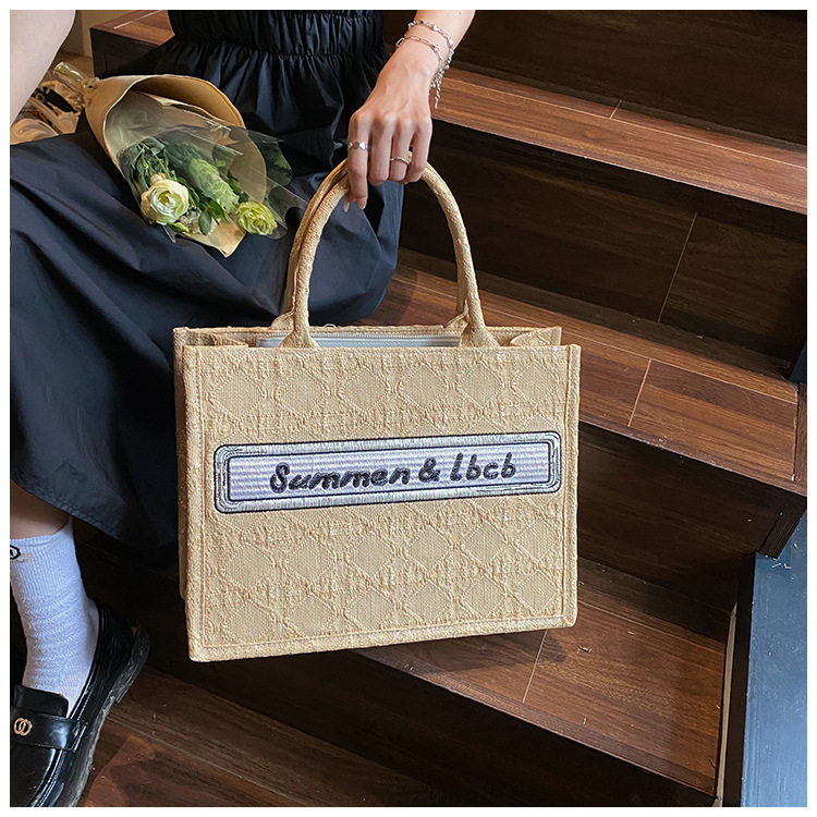 Baigou Wholesale Bag Women 2023 New European and American Trend Portable Canvas Bag Large Capacity Embroidered Alphabet Tote Bag_voghion.com