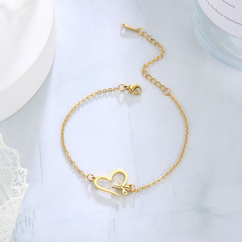 Stainless steel bracelet creative design sense of love hair tool pendant bracelet jewelry_voghion.com