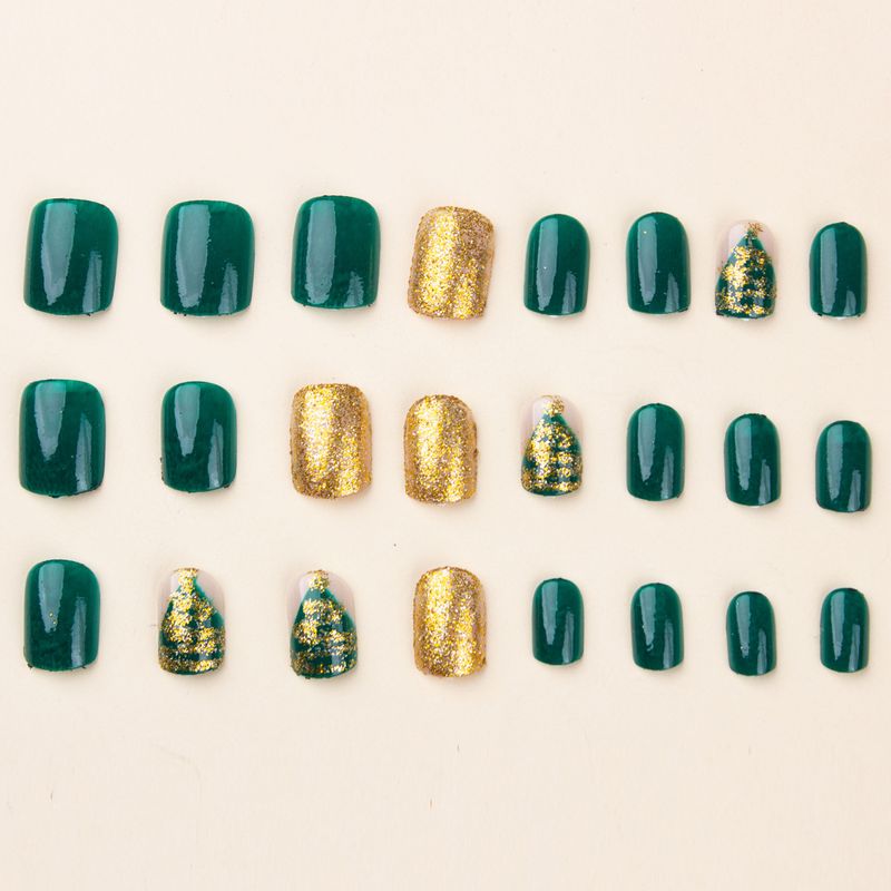 Unghie finte natalizie, unghie corte quadrate, albero di Natale glitterato, elemento natalizio di colore puro, unghie finte finite e indossabili, nail art natalizia_voghion.com