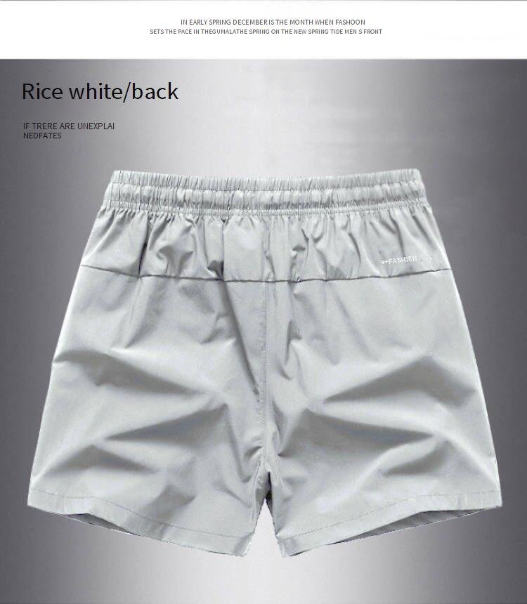 Men's Clothing Fashionable Beach Leisure Solid Color Quick Drying Loose Sports Shorts_voghion.com