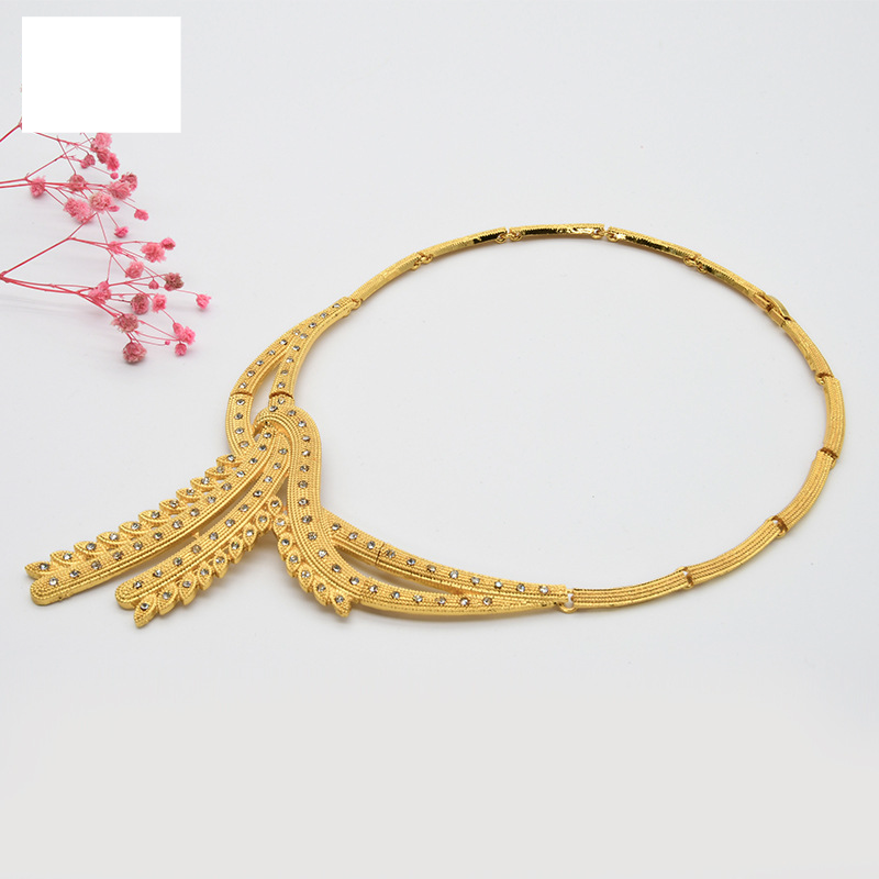 Gouden bruidsketting Armband Oorbellen Ringaccessoires Vierdelige damessieradenset_voghion.com