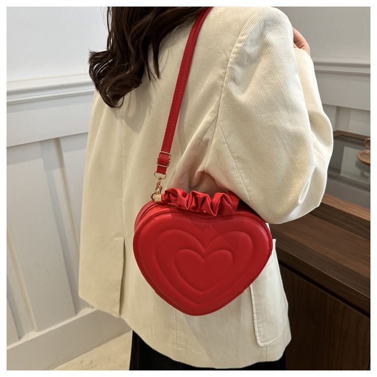 Indentatura semplice a forma di cuore carina tinta unita femminile cuore shopping moda plissettata borsa a tracolla_voghion.com