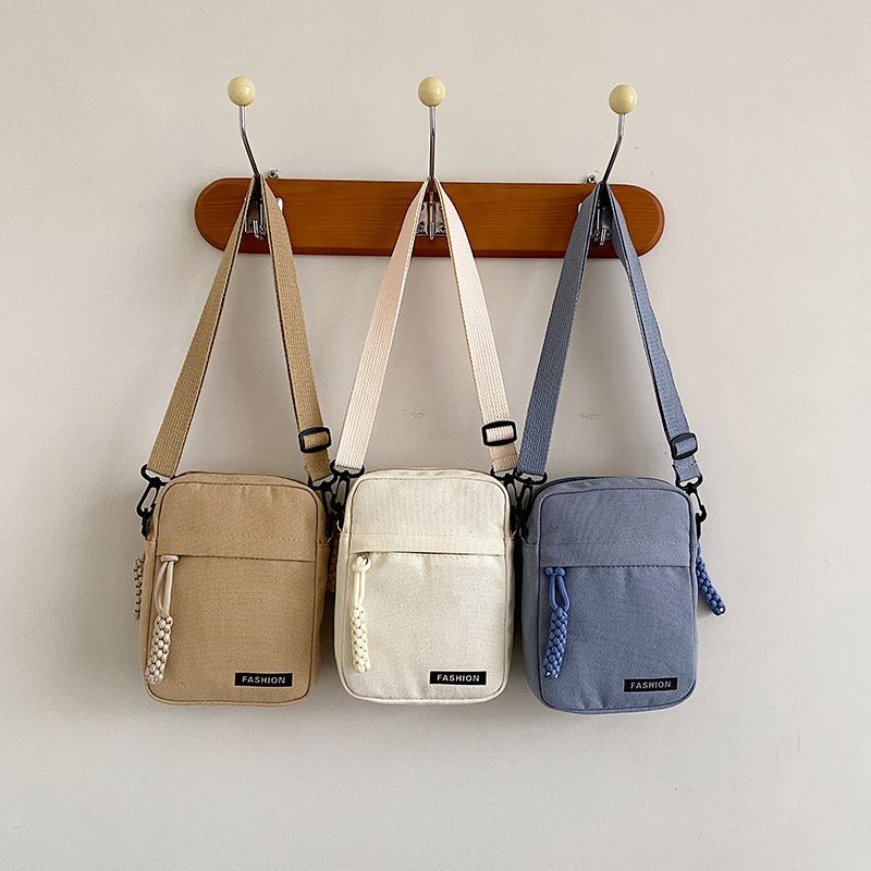 2025 Neue Mini-Canvas-Telefon-modische leichte vertikale Umhängetasche für Damen, vielseitige Schultertasche für den täglichen Gebrauch, kleine quadratische Tasche_voghion.com