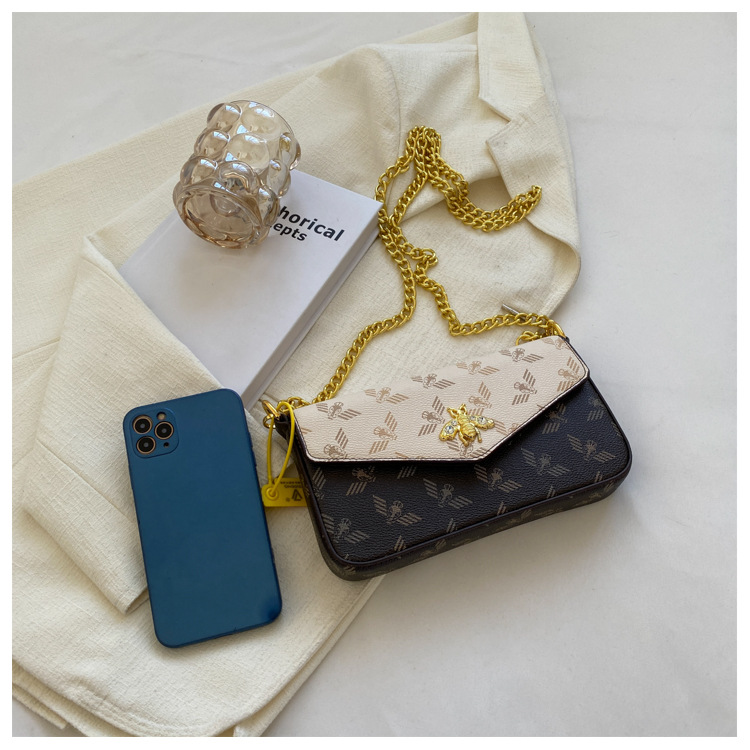 2023 nuova catena di moda singola spalla obliqua straddle piccola borsa versatile borsa a busta retrò piccola borsa quadrata marea_voghion.com