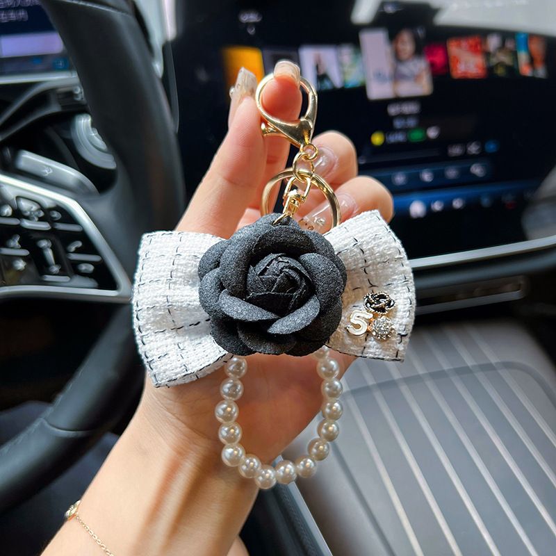 Personalized pearl chain, small fragrance bow, camellia creative and exquisite car keychain, bag decoration, female_voghion.com