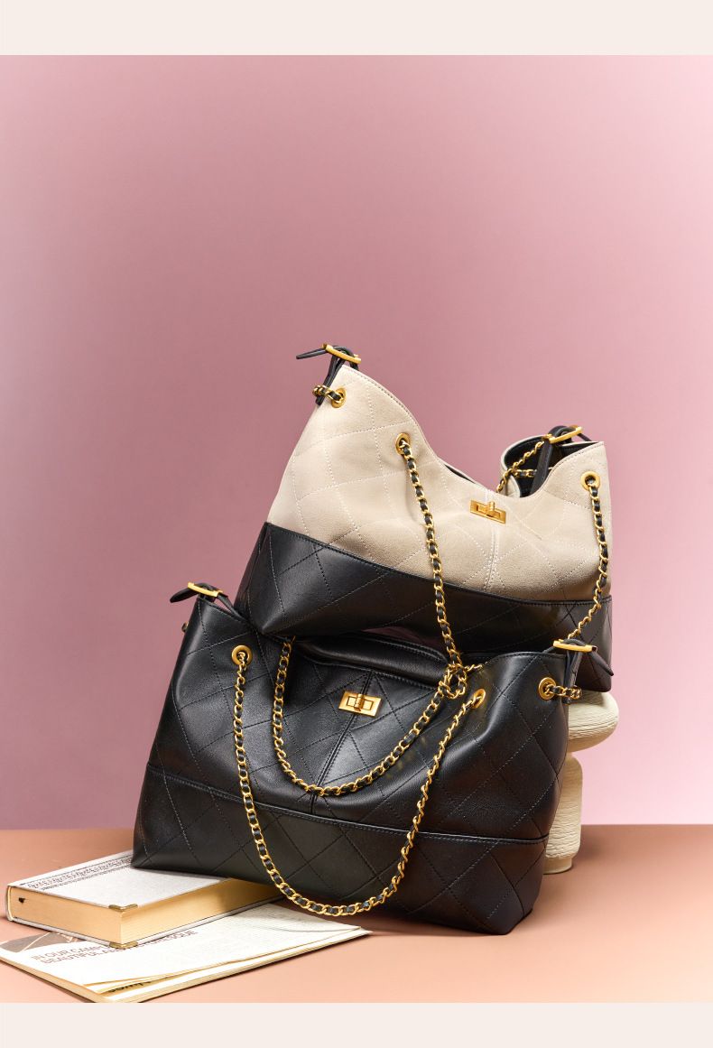 Borsa tote, spaziosa borsa a tracolla con tracolla a catena progettata per gli oggetti essenziali di tutti i giorni - Realizzata in vera pelle, incarna lo stile contemporaneo_voghion.com