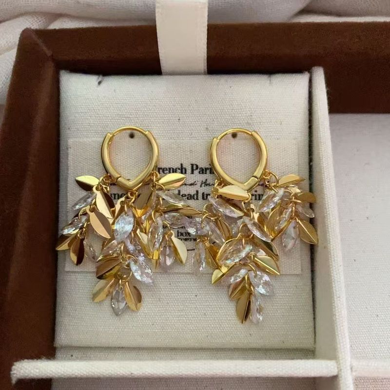 Wind Hollow Tassel Golden Branch Jade Leaf Ear Clips Elegant Exaggerated Goddess High-end Earrings_voghion.com