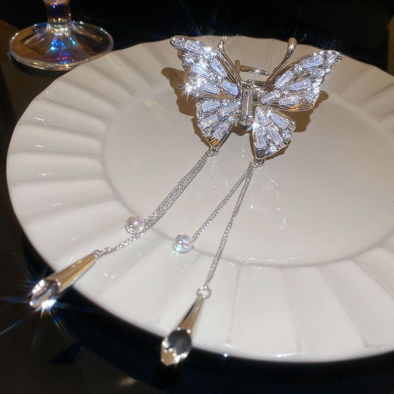 Stile designer diamante intarsiato farfalla carillon di vento nappa afferrare clip moda versatile squalo clip temperamento accessori per capelli clip_voghion.com