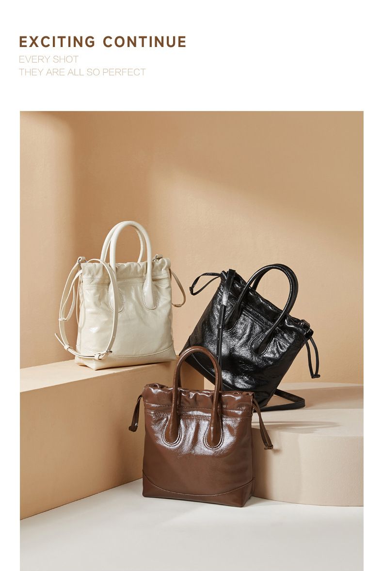 Borsa a secchiello vintage in vera pelle con coulisse - Borsa a tracolla morbida e stropicciata per donna, taglia media, nero/marrone/crema_voghion.com
