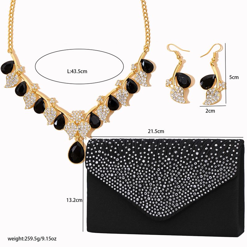 Set di gioielli da donna con collana di cristalli, pochette da sera, elegante design floreale per occasioni formali, versatile set di collana e orecchini di cristalli_voghion.com