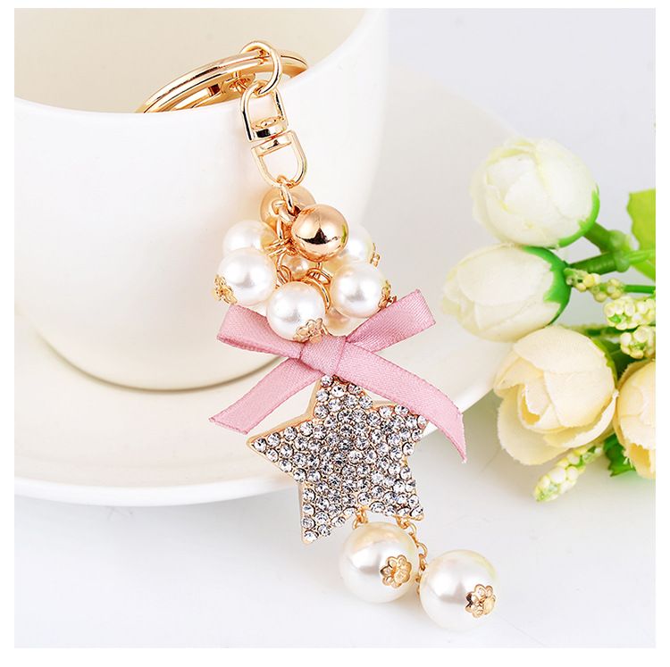 Koreanische Version Exquisite Perlenschleife Anhänger Auto Schlüsselanhänger Mode Kreativer Fünfzackiger Stern Damen Taschenanhänger_voghion.com