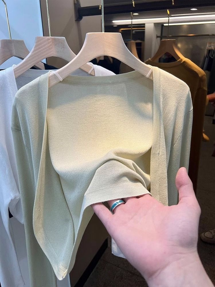 Gonna canotta estiva da donna in maglia di seta ghiacciata corta e tinta unita con protezione solare, abbinata a una giacca in garza sottile._voghion.com