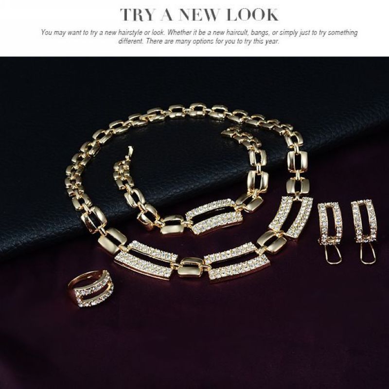Ein kompletter Schmuck aus Legierung, Halskette, Ohrringe, Armband, Ring, exquisites vierteiliges Set mit Strassverzierung_voghion.com
