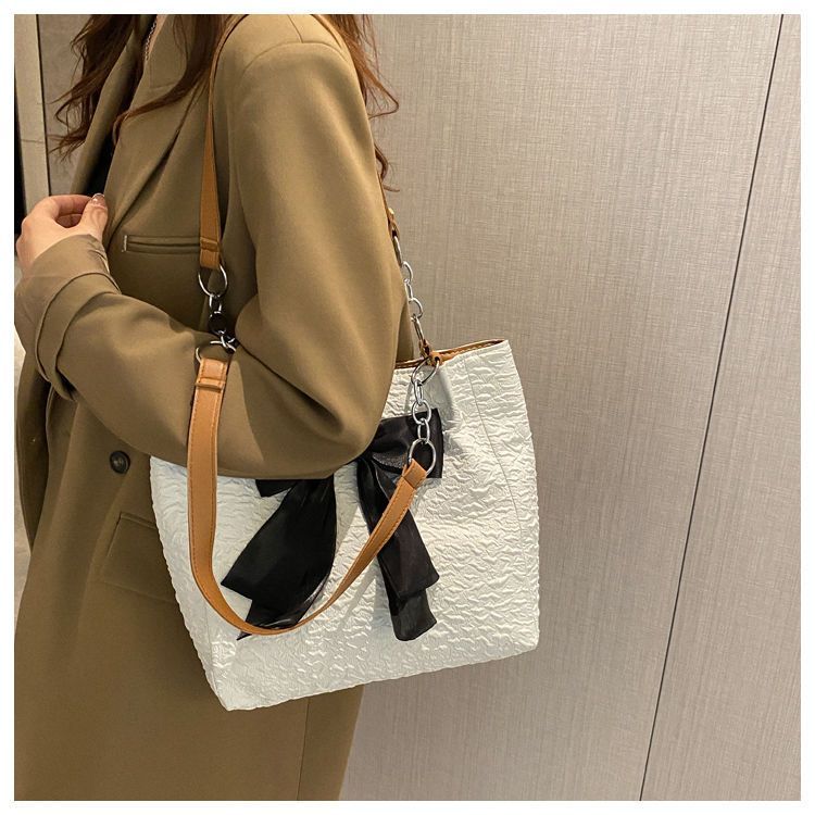 Borsa a mano versione coreana per donna 2022 nuova borsa a tracolla con fiocco di nicchia estiva grande capacità borsa in tela carina singola_voghion.com