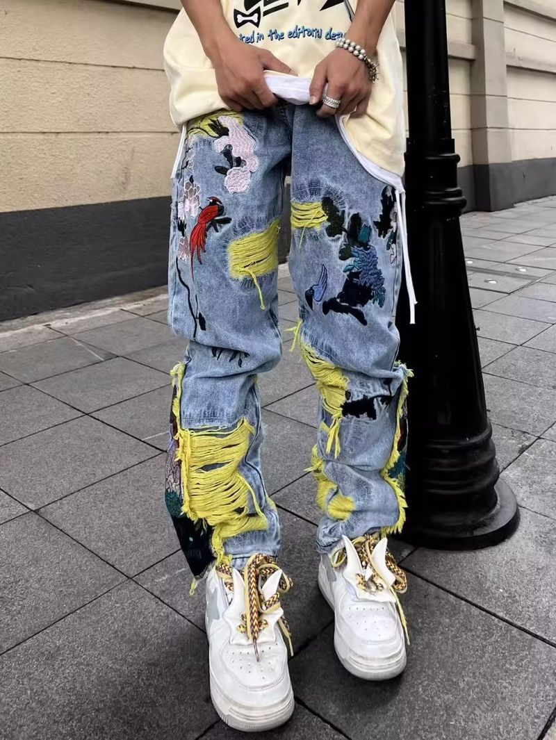 Vīriešu apģērbs Ielas džinsi ar bieziem izšuvumiem, saplēstas vīriešu garās bikses_voghion.com