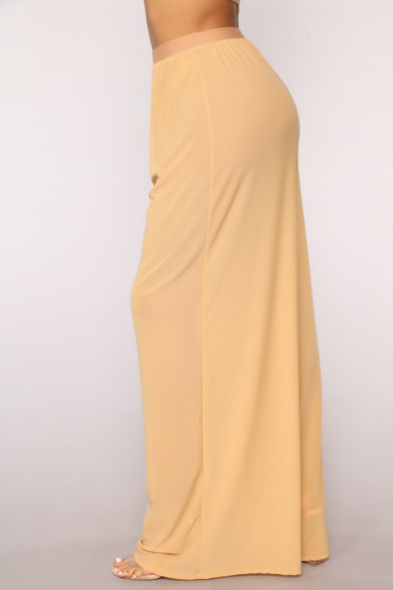 Pantaloni da donna a gamba larga trasparenti sexy in rete di colore puro_voghion.com