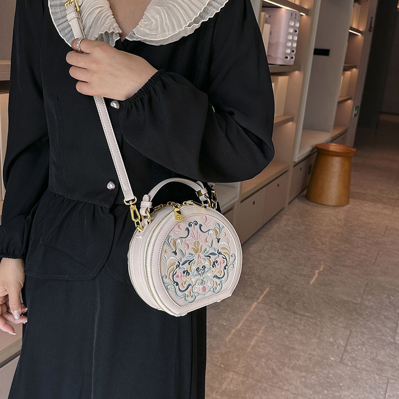 Nischen-Handtaschen mit hochwertiger Textur und Stickerei für Damen 2024, neuer Stil, trendiger literarischer chinesischer Stil, kleine runde Umhängetasche mit einer Schulter_voghion.com