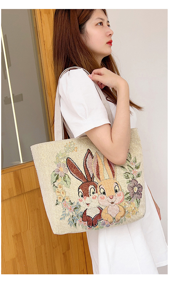 Nuova borsa a tracolla con coppia di elefanti ricamata in jacquard di seta oro bifacciale Borsa da tutor Borsa da pendolare Borsa da ascella_voghion.com