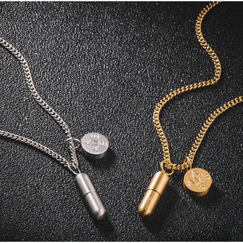 New trendy capsule pill necklace with simple and fashionable design. Couples can twist open the love antidote pendant_voghion.com