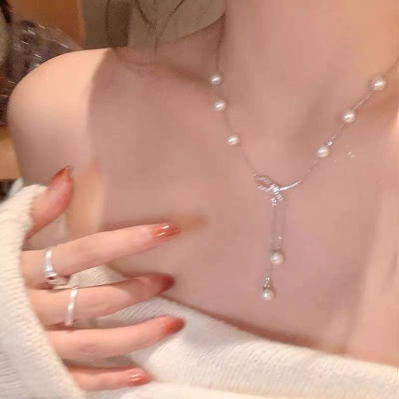 Collana in acciaio al titanio con fiocco, perla, nappa, clavicola, temperamento, jolly, nicchia, perline, catena per maglione, accessori, gioielli_voghion.com