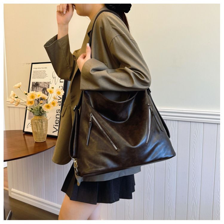Borsa a secchiello con zaino grande capacità, casual, alla moda coreana, nuova tendenza autunno 2025 da donna_voghion.com