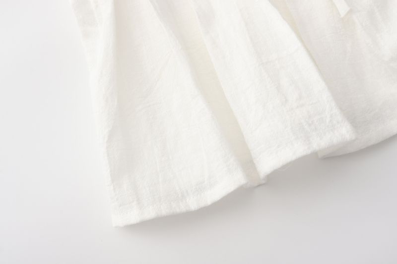 Completo da donna europeo e americano, primavera ed estate 2025, in cotone e lino, senza maniche, due pezzi, con camicia e gonna lunga da donna con spalline sottili._voghion.com