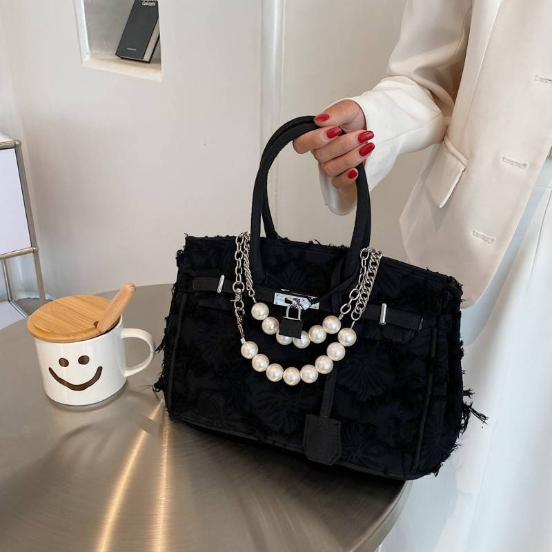 A niche design pearl women's chain bag with a new vintage rag beggar platinum single shoulder crossbody light luxury handbag_voghion.com