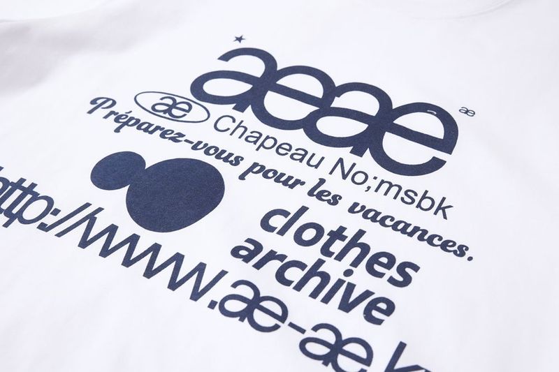 Aeae Top alla moda coreano con stampa di lettere, estivo, dolce, largo, snellente, a maniche corte, da donna_voghion.com