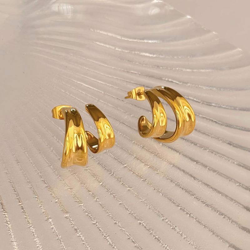 Orecchini in oro e argento squisiti, a doppio strato, in acciaio al titanio placcato oro vero e finemente lucidato._voghion.com