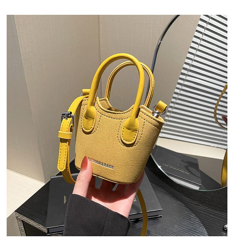 Borsa a secchiello da donna, alla moda, con tracolla monospalla, stile Candy Lover, con rossetto, da portare a spalla, rossa_voghion.com