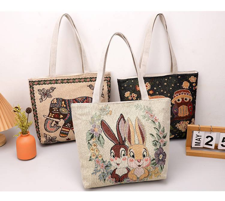 Nuova borsa a tracolla con coppia di elefanti ricamata in jacquard di seta oro bifacciale Borsa da tutor Borsa da pendolare Borsa da ascella_voghion.com