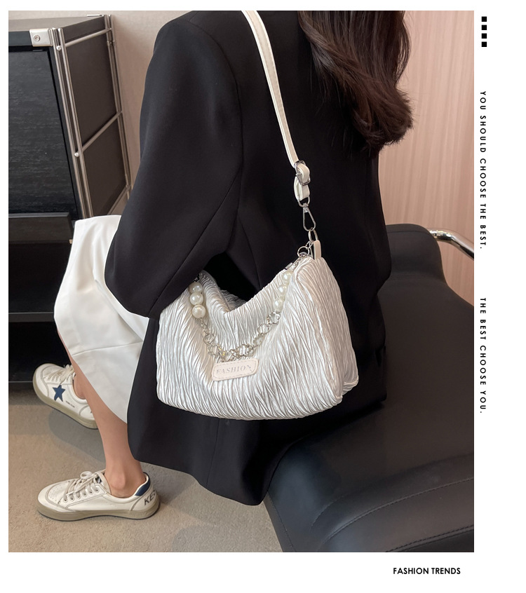 Väska Damer 2023 Nytt mode High-end All-match nischdesign Enfärgad canvas bärbar axel crossbody trendig väska_voghion.com