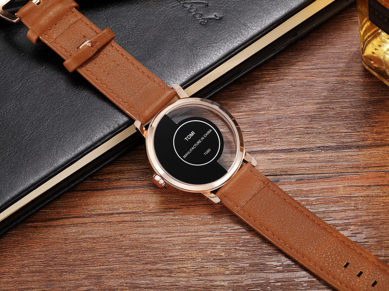 Reloj unisex TOMI con diseño especial de arroz hueco, transparente por la mitad, con correa de cuero, informal, de moda y neutral_voghion.com