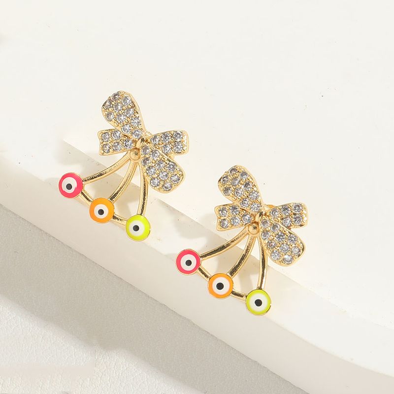 1 paio di orecchini a bottone in stile semplice, stile classico, con nodo a fiocco, occhio del diavolo, intarsi in smalto, zircone in rame, placcati in oro 14 carati_voghion.com