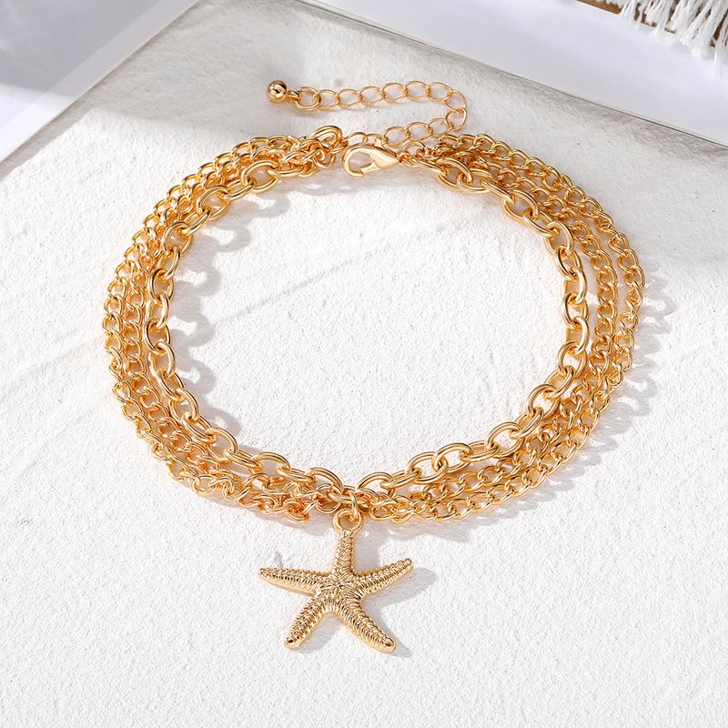Women's New Beach Summer Vacation Bohemian Multi-layer Leg Chain Hollow Chain Foot Decoration Fringed Starfish Pendant Three-layer Anklet Women_voghion.com