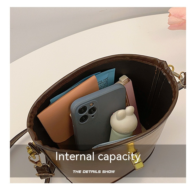 2024 New Women's Bag High End and Fashionable Handheld Bag Women's Retro and Simple Water Bucket Bag Small Cross Body Shoulder Bag_voghion.com