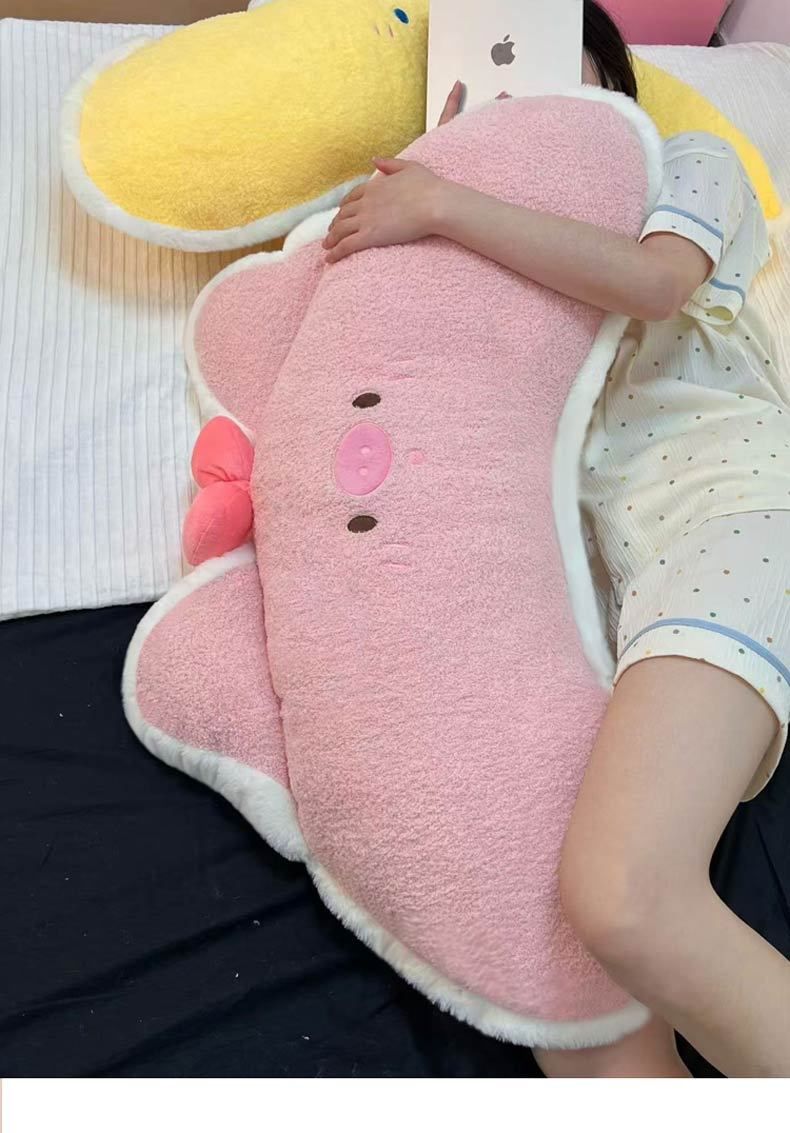 Süßes rosa Schweinchen mit Nackenrolle für Mädchen, um ihre Beine am Bett zu befestigen und so die Lendenwirbelsäule beim Schlafen zu stützen._voghion.com