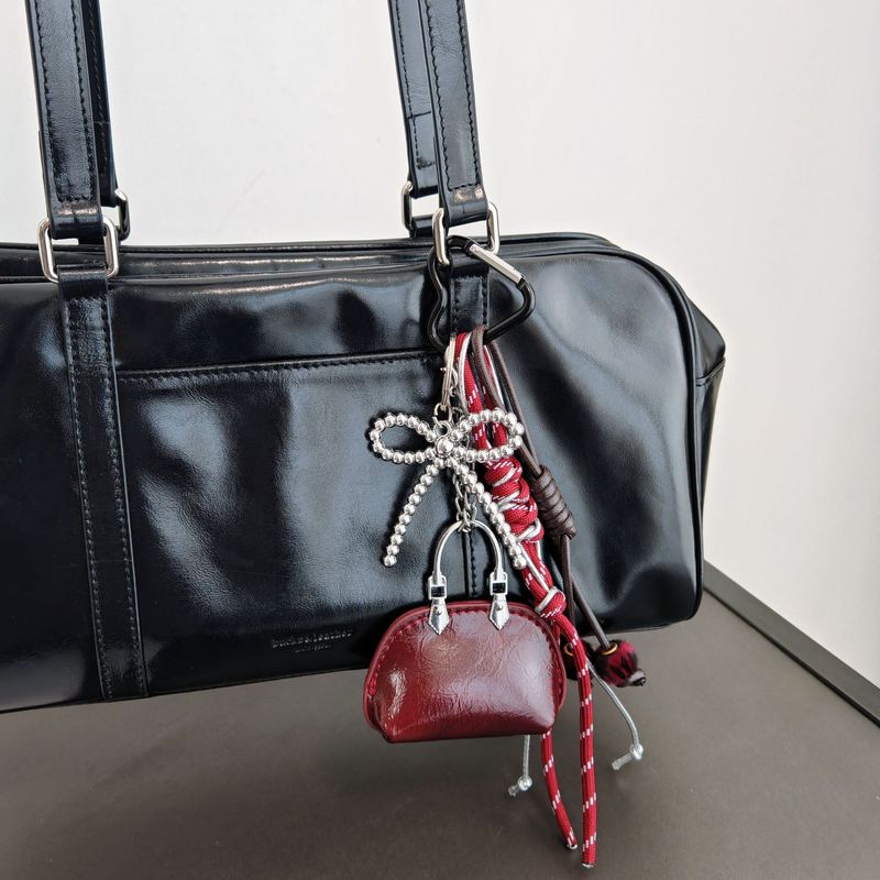 Wisiorek do torby Mix And Match Ekstremalnie skomplikowany wisiorek w stylu metalowym z kokardą z koralików i plecioną liną_voghion.com