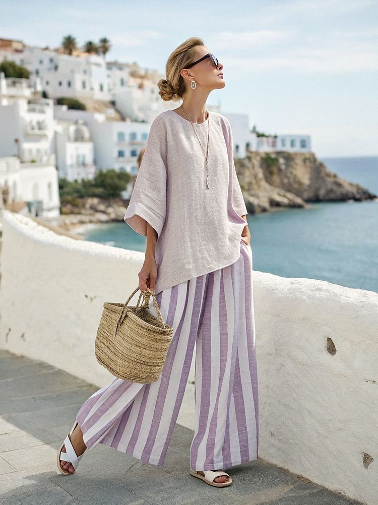 Completo due pezzi in cotone e lino con camicia a maniche corte e pantaloni, modello Island Vacation, modello ampio con scollo rotondo e pantaloni a vita alta_voghion.com
