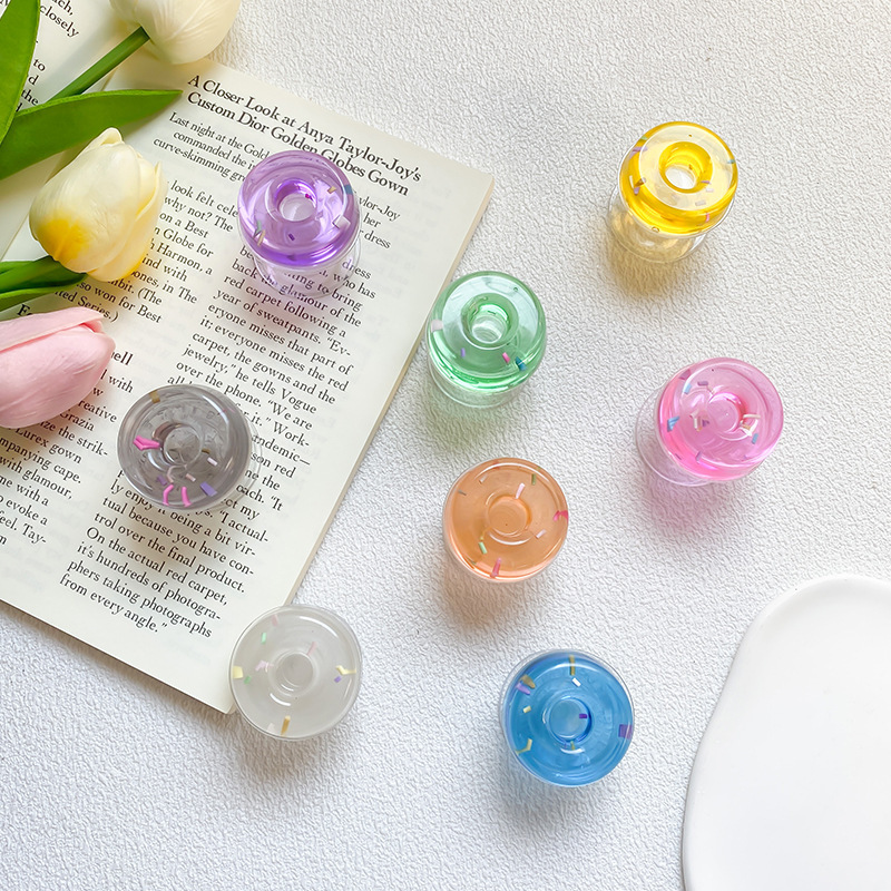 Transparent mobile phone airbag bracket, solid color donut adhesive, stable desktop, lazy person watching chasing_voghion.com