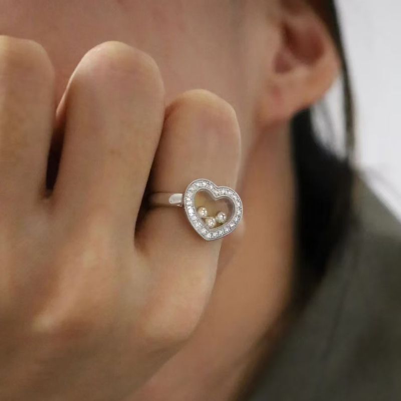 Gioielli di moda Happy For Women Anello di fidanzamento con tre diamanti a forma di cuore in oro rosa_voghion.com